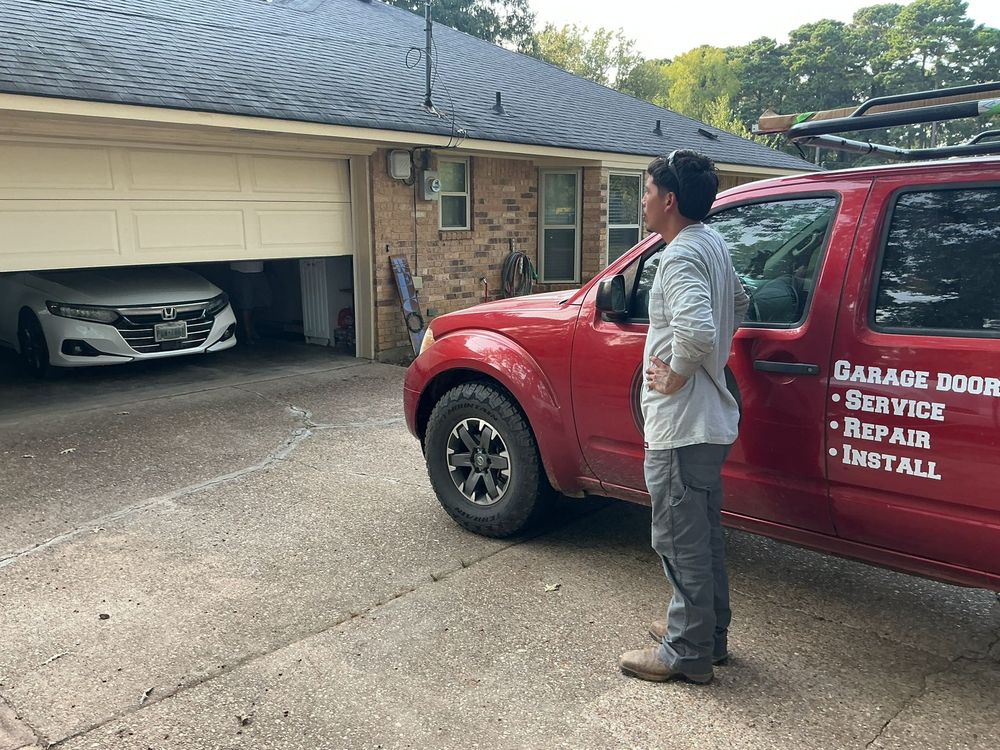 Maintenance crew checking garage door operation